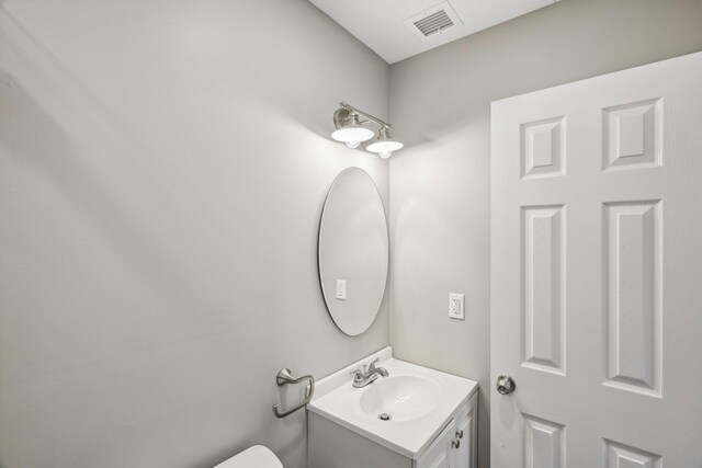70 Propose Rd, Shirley, NY 11967 - half bath with vanity and toilet