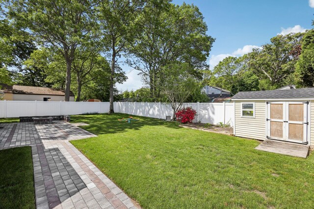 70 Propose Rd, Shirley, NY 11967 - view of yard featuring a patio area