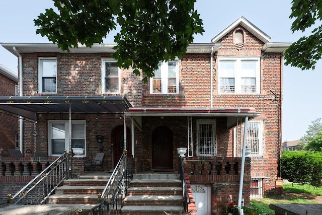 1681 Brooklyn Ave, Brooklyn, NY 11210 - view of property with brick siding and covered porch