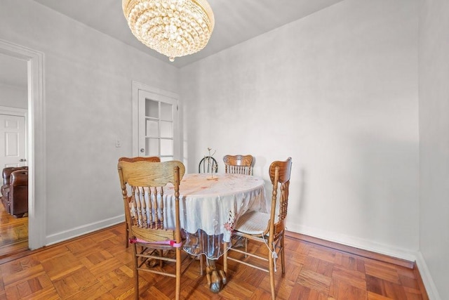 1681 Brooklyn Ave, Brooklyn, NY 11210 - dining room featuring a chandelier and baseboards