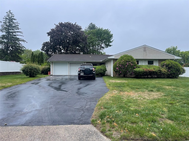 26 Mosshill Pl, Stony Brook, NY 11790 - ranch-style house featuring driveway, a front lawn, and a garage