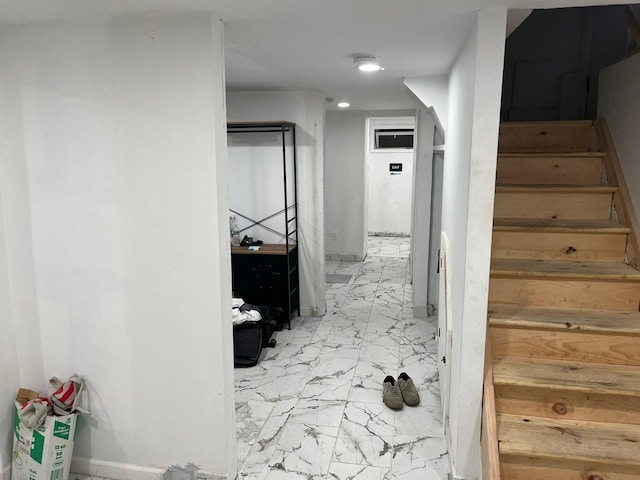 21 James Ll Burrell Ave, Hempstead, NY 11550 - stairway featuring marble look tile flooring and recessed lighting
