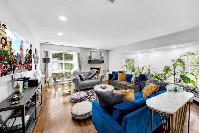 1223 Weaver St, New Rochelle, NY 10804 - living area featuring wood finished floors, a fireplace, and recessed lighting