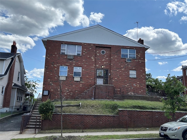 2110 Light St, Bronx, NY 10466 - view of home's exterior featuring brick siding and a chimney