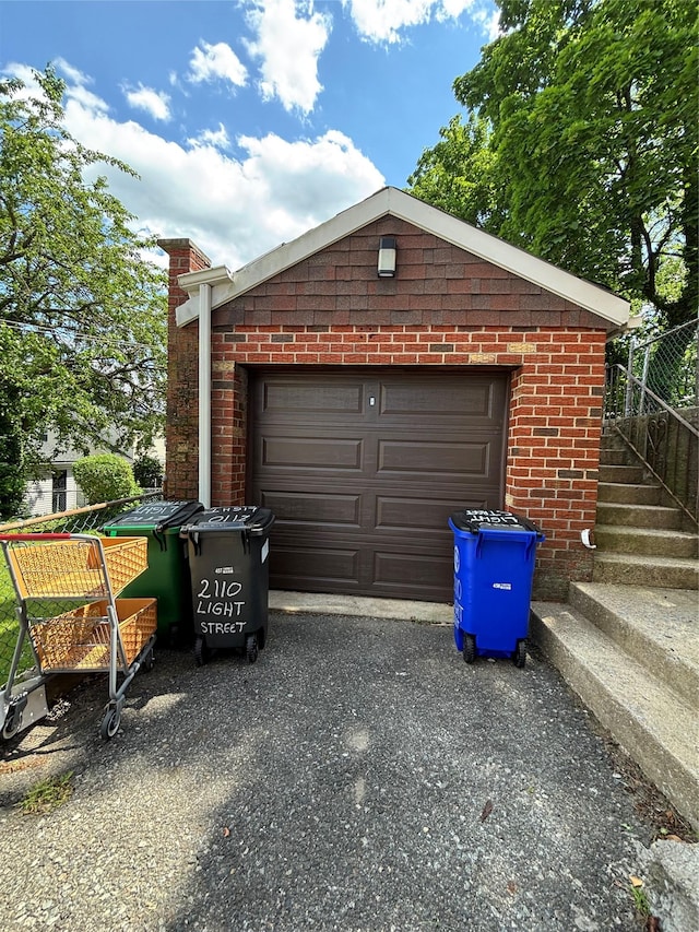 2110 Light St, Bronx, NY 10466 - garage featuring asphalt driveway