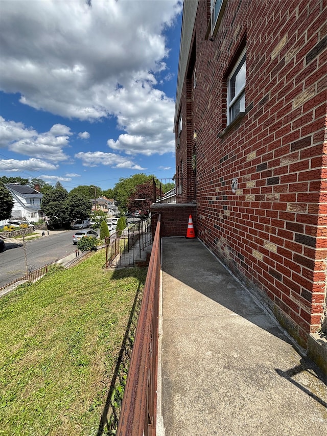 2110 Light St, Bronx, NY 10466 - view of side of home featuring brick siding and a yard