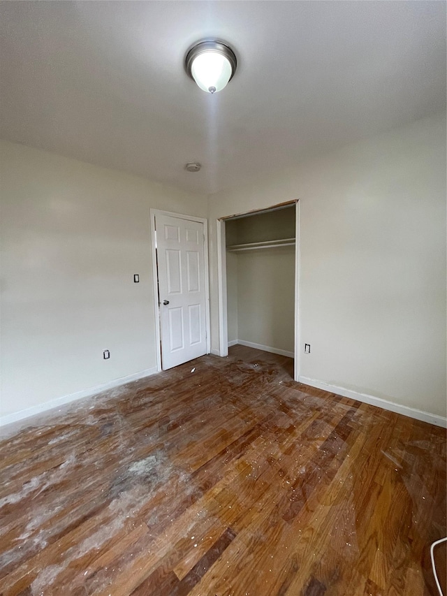 2110 Light St, Bronx, NY 10466 - unfurnished bedroom featuring wood finished floors, baseboards, and a closet