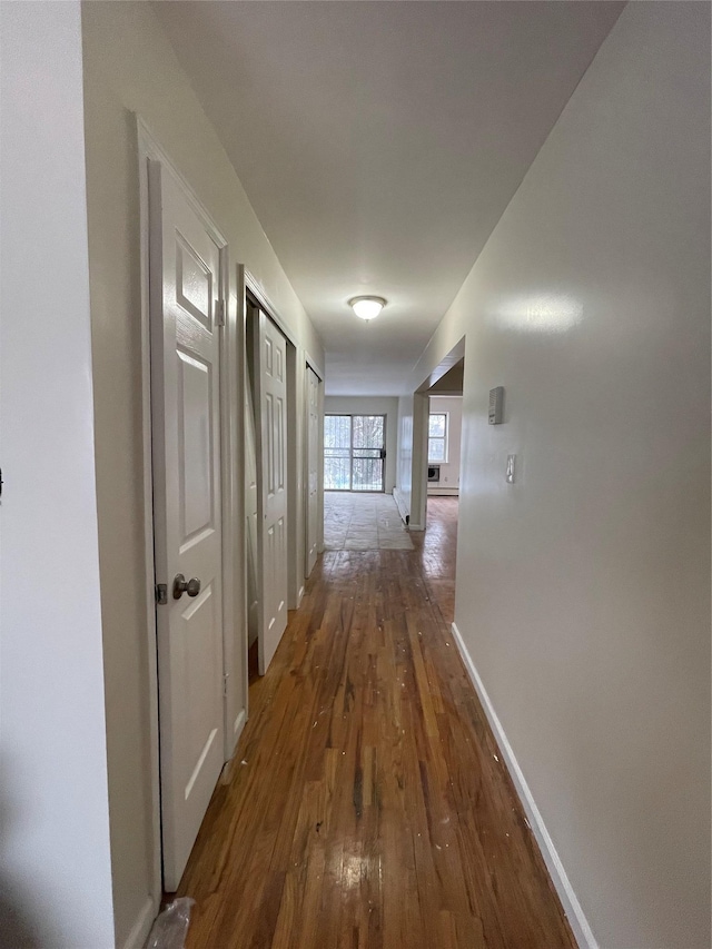2110 Light St, Bronx, NY 10466 - hallway with dark wood-style flooring and baseboards