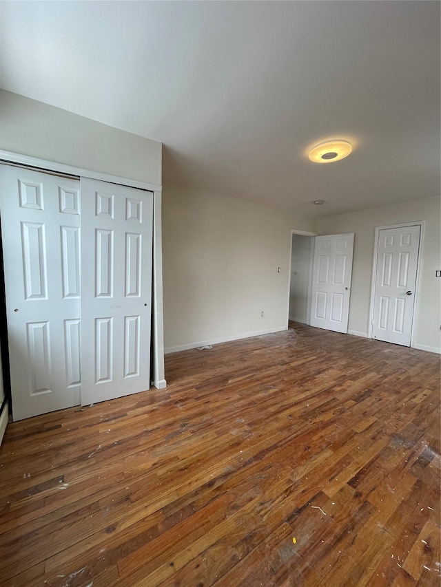 2110 Light St, Bronx, NY 10466 - unfurnished bedroom with wood-type flooring and baseboards