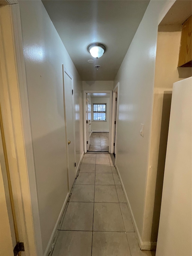 2110 Light St, Bronx, NY 10466 - corridor with light tile patterned floors and baseboards