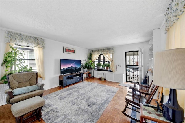 611 Clarence Ave, Bronx, NY 10465 - living room featuring a textured ceiling