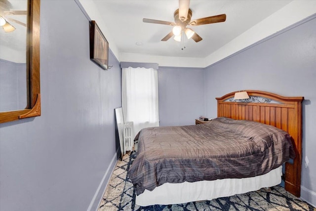 611 Clarence Ave, Bronx, NY 10465 - bedroom with baseboards, a ceiling fan, and radiator heating unit