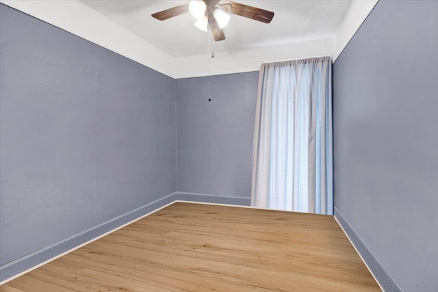 611 Clarence Ave, Bronx, NY 10465 - unfurnished room featuring wood finished floors, ceiling fan, and baseboards
