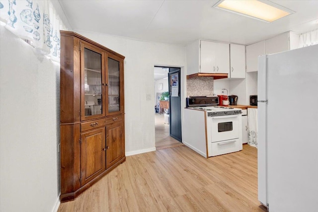 611 Clarence Ave, Bronx, NY 10465 - kitchen featuring white appliances, light wood-style flooring, white cabinetry, glass insert cabinets, and baseboards