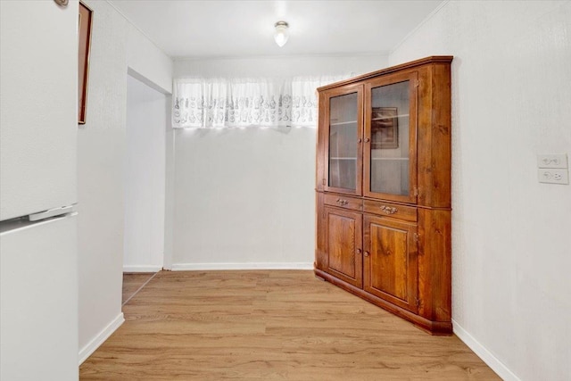 611 Clarence Ave, Bronx, NY 10465 - hall with light wood finished floors and baseboards