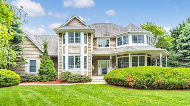 1260 Water Ter, Southold, NY 11971 - view of front of home with a front lawn and roof with shingles