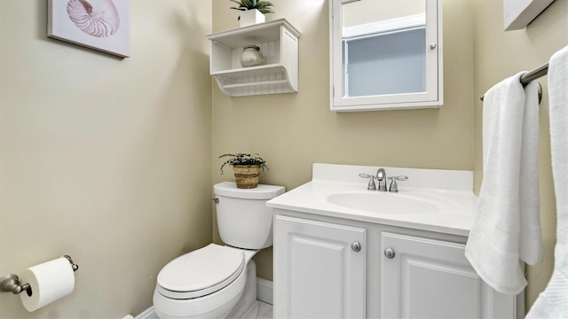 1260 Water Ter, Southold, NY 11971 - half bathroom with toilet, vanity, and baseboards