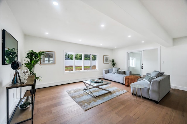 205 Blueberry Ln, Hicksville, NY 11801 - living area with hardwood / wood-style flooring, recessed lighting, baseboards, and a baseboard radiator