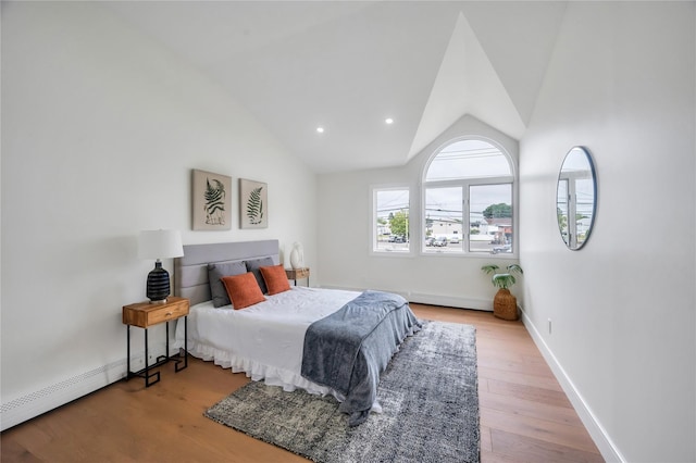 205 Blueberry Ln, Hicksville, NY 11801 - bedroom featuring wood finished floors, vaulted ceiling, baseboards, and recessed lighting