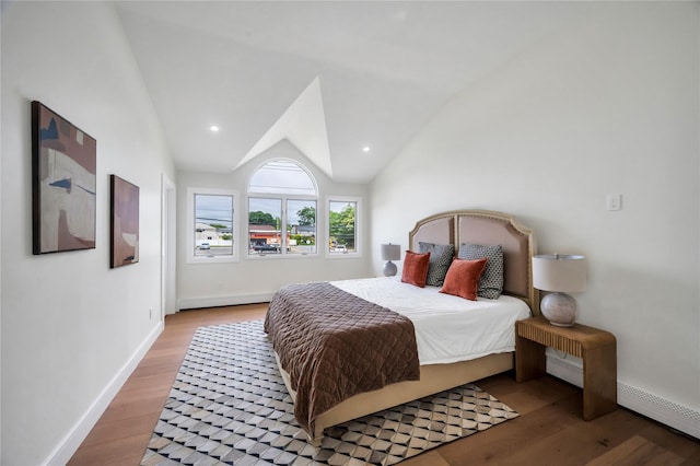205 Blueberry Ln, Hicksville, NY 11801 - bedroom with wood finished floors, baseboards, lofted ceiling, a baseboard radiator, and recessed lighting