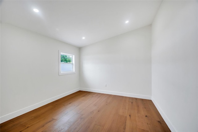 205 Blueberry Ln, Hicksville, NY 11801 - spare room with light wood-style floors, baseboards, and recessed lighting