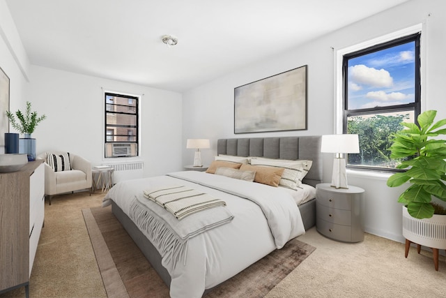 10 N Broadway Unit 3H, White Plains, NY 10601 - carpeted bedroom featuring radiator heating unit and cooling unit