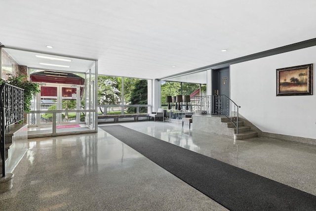 10 N Broadway Unit 3H, White Plains, NY 10601 - building lobby with floor to ceiling windows and stairs