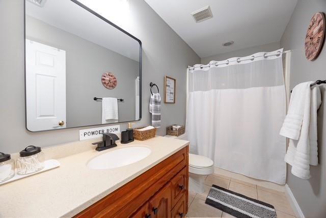 66 Carol Ln, Poughquag, NY 12570 - full bath featuring vanity, tile patterned flooring, toilet, and a shower with curtain