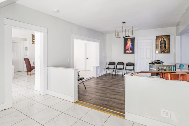 45 Cragmere Rd, Airmont, NY 10901 - kitchen featuring a chandelier and baseboards