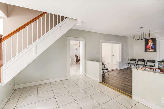 45 Cragmere Rd, Airmont, NY 10901 - dining area with stairs, baseboards, and light marble finish floors