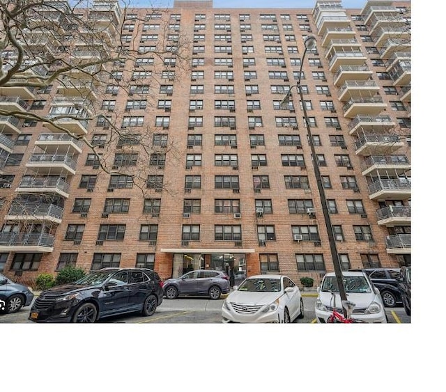 42-55 Colden St Unit 15B, Flushing, NY 11355 - view of apartment building / complex featuring uncovered parking