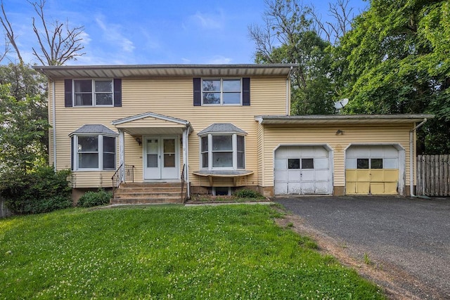12 Gillis Ave, Nyack, NY 10960 - traditional-style home with a garage, driveway, and entry steps