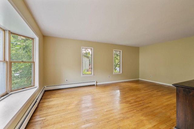 12 Gillis Ave, Nyack, NY 10960 - spare room with a baseboard radiator, plenty of natural light, and light wood finished floors
