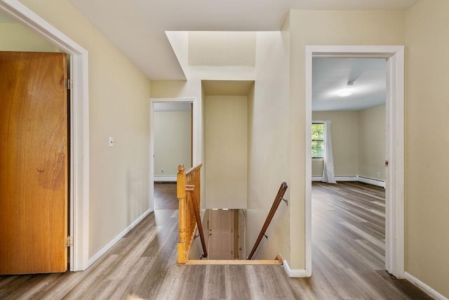 12 Gillis Ave, Nyack, NY 10960 - corridor featuring an upstairs landing, wood finished floors, and baseboard heating