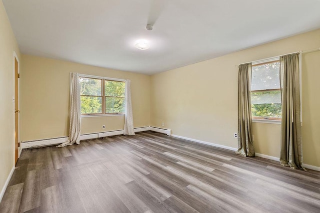 12 Gillis Ave, Nyack, NY 10960 - spare room with wood finished floors and a baseboard radiator