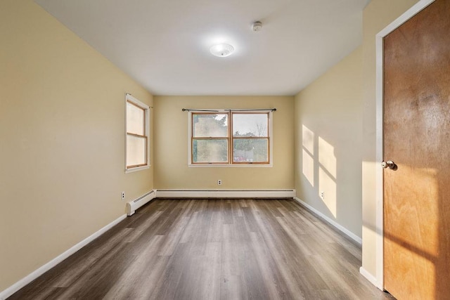 12 Gillis Ave, Nyack, NY 10960 - empty room featuring wood finished floors, baseboard heating, and a smoke detector