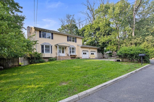 12 Gillis Ave, Nyack, NY 10960 - view of front of property featuring an attached garage and a chimney