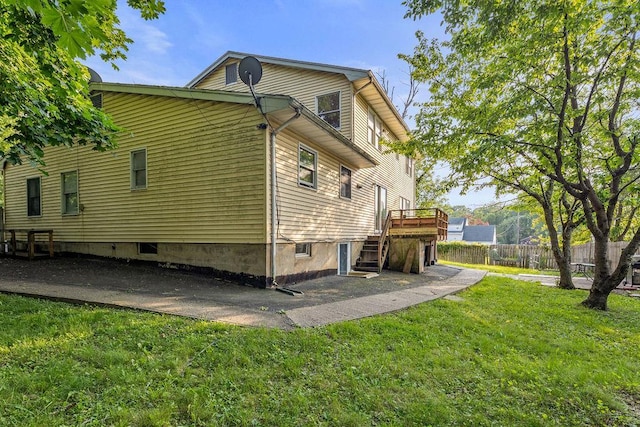 12 Gillis Ave, Nyack, NY 10960 - view of side of home featuring stairway, a deck, and a patio