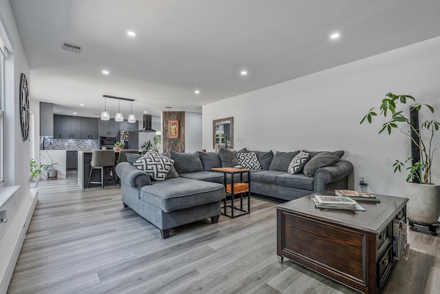 8 Hamilton Pl, Lake Grove, NY 11755 - living area with recessed lighting and light wood-type flooring