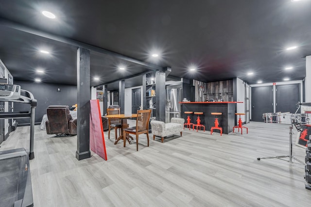 8 Hamilton Pl, Lake Grove, NY 11755 - miscellaneous room with wood finished floors and a bar