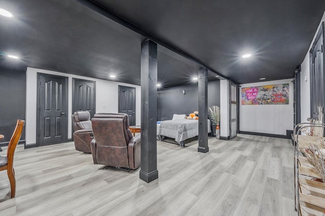8 Hamilton Pl, Lake Grove, NY 11755 - home theater room featuring light wood-type flooring, baseboards, and recessed lighting