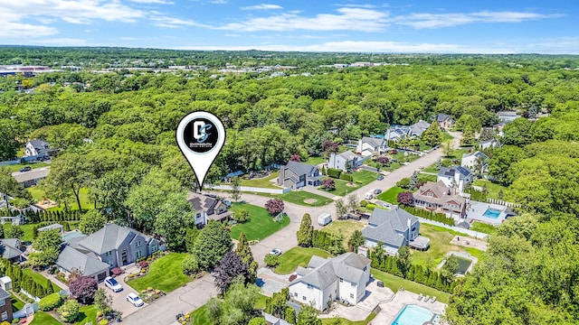 8 Hamilton Pl, Lake Grove, NY 11755 - aerial view of residential area featuring a heavily wooded area