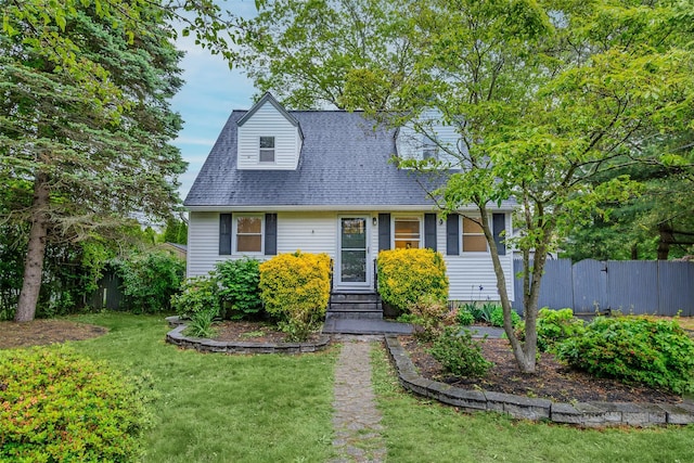59 Burney Blvd, Mastic, NY 11950 - new england style home featuring entry steps and roof with shingles