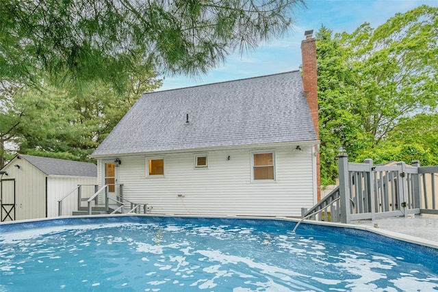59 Burney Blvd, Mastic, NY 11950 - view of swimming pool featuring a wooden deck