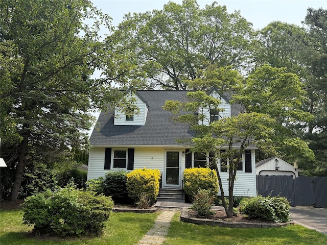 59 Burney Blvd, Mastic, NY 11950 - view of front of home with a gate and entry steps