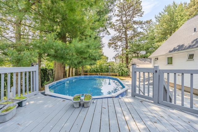59 Burney Blvd, Mastic, NY 11950 - wooden terrace with an outdoor structure