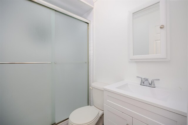 59 Burney Blvd, Mastic, NY 11950 - bathroom featuring vanity and a shower stall