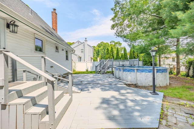 59 Burney Blvd, Mastic, NY 11950 - view of patio featuring a deck and stairs