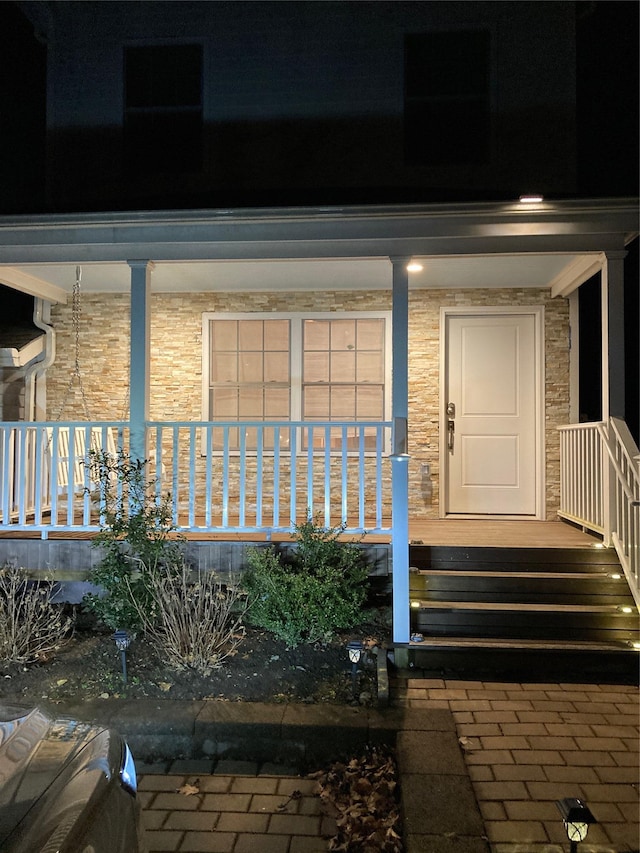 1626 Mogul Dr Unit 1626, Mohegan Lake, NY 10547 - view of exterior entry with stone siding and covered porch