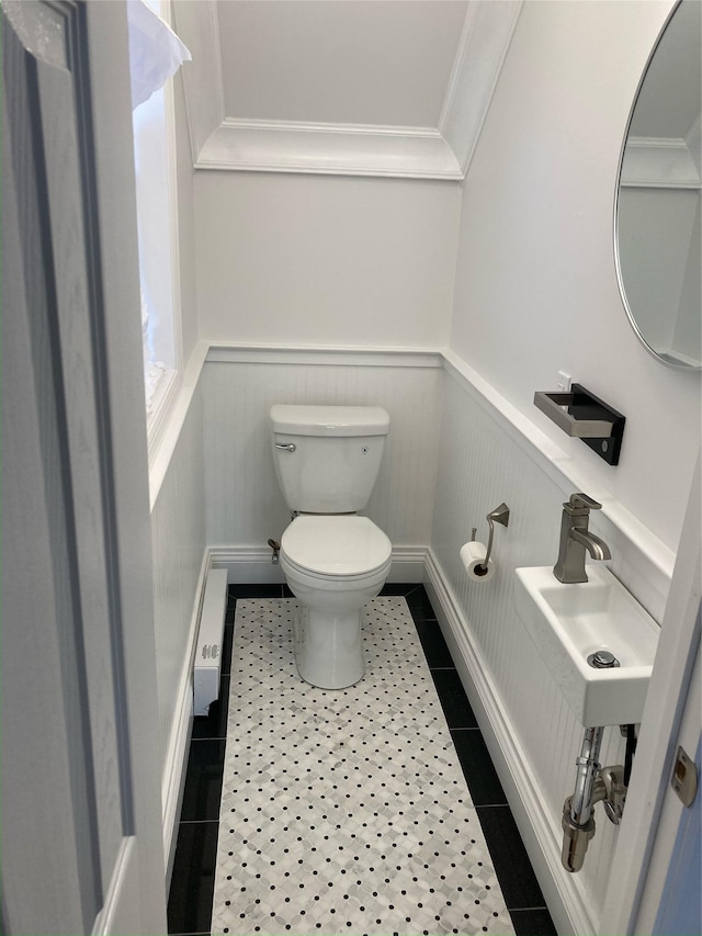 1626 Mogul Dr Unit 1626, Mohegan Lake, NY 10547 - bathroom with toilet, a wainscoted wall, and tile patterned floors